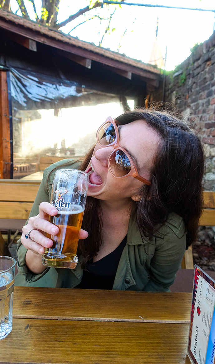 mimi drinking beer in Belgrade Serbia